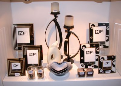 Reed Gift Fair - NF Entertain (Entertaining Essentials) NF Gifts NF Essentials Outdoor Products Cookware & Tabletop Items Wall Art Cushions Hear See Speak Statues Throws Plates Cups Mugs Teapots Chopping Boards wooden painting prints figurines trays inflatable tablecloths napery vases planters faux florals artificial plants real touch flowers Glass Photo Frames Metal Candle SticksExplore the vibrant highlights of NF's collection of homewares, gifts & lifestyle products that captivated retailers in 2005
